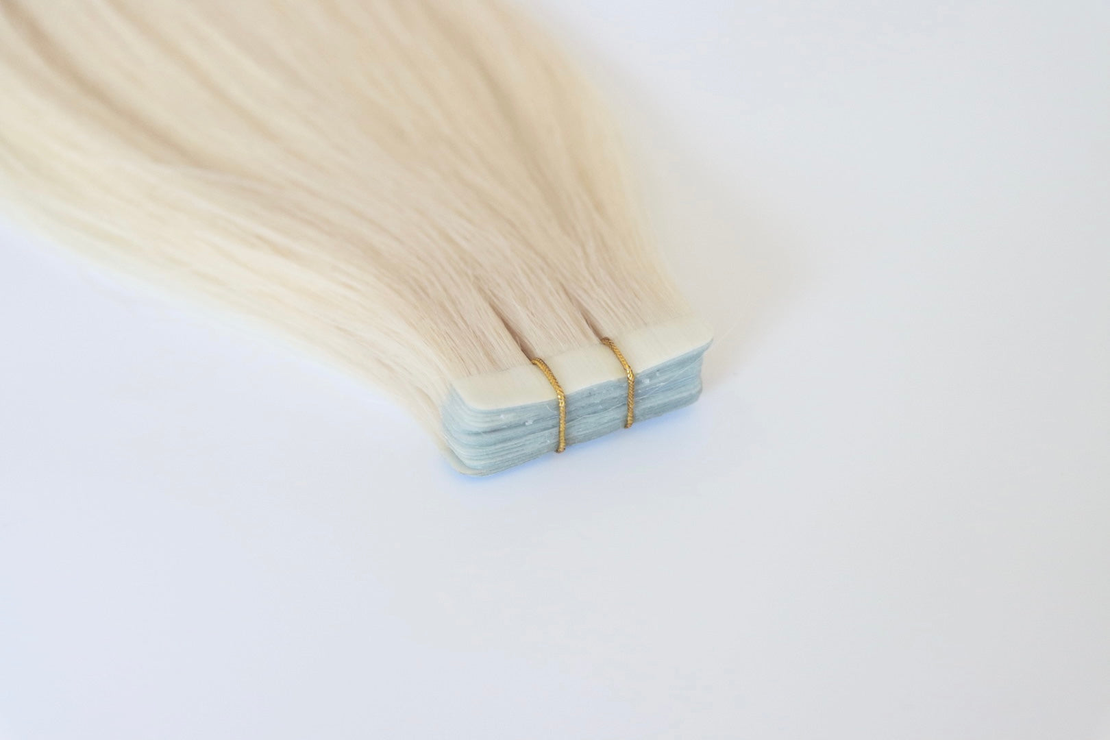 Sophia Hair Australia Tape In Hair Extensions on a white background