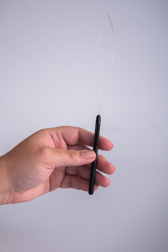 Plastic Microbead Loop Threader in Hand